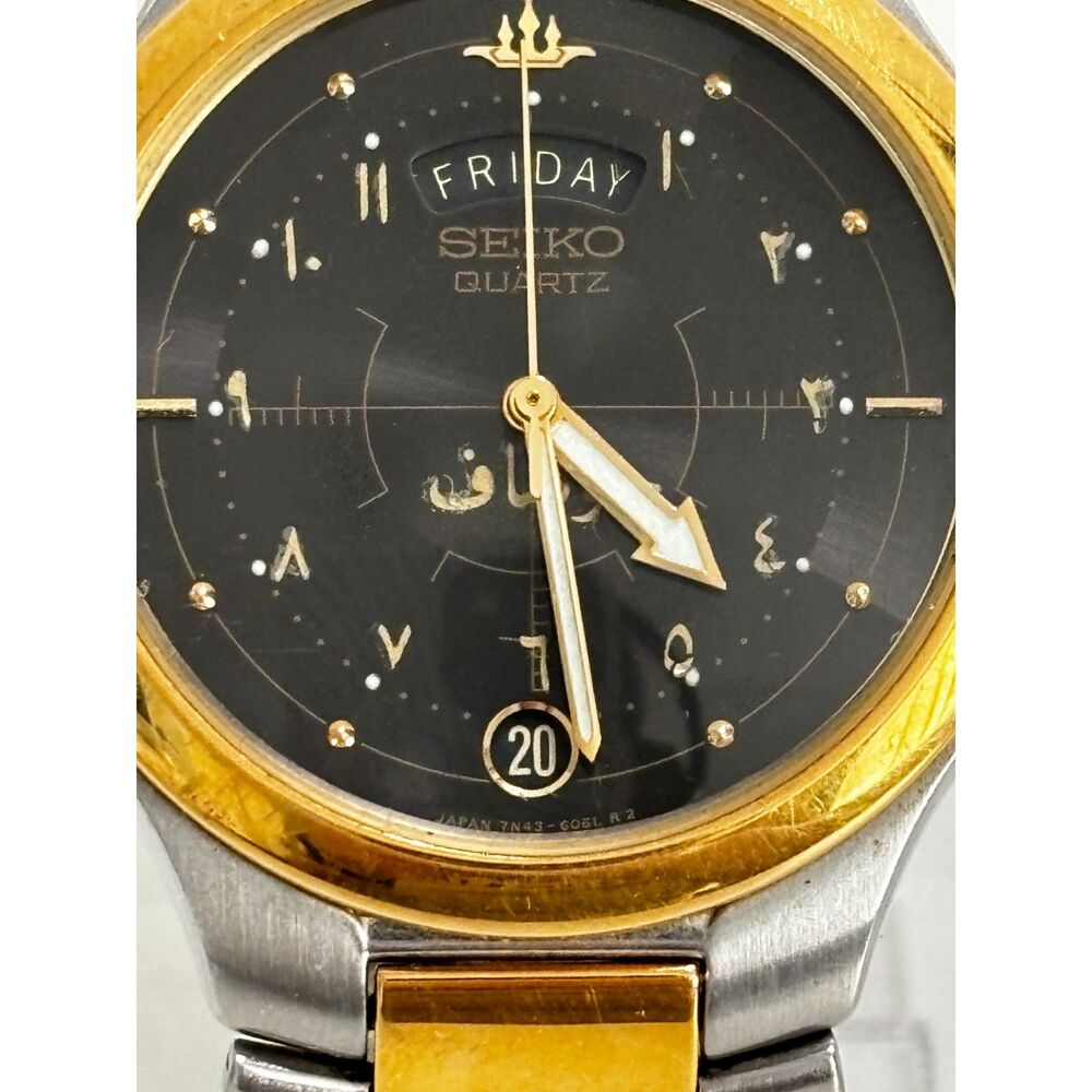 Seiko Trident 7N43-6030 2-tone day date quartz men's watch in Arabic, working